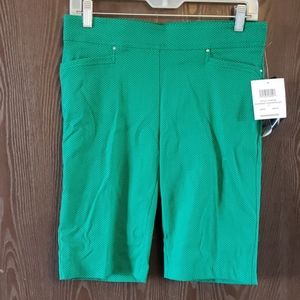 Green and white golf shorts